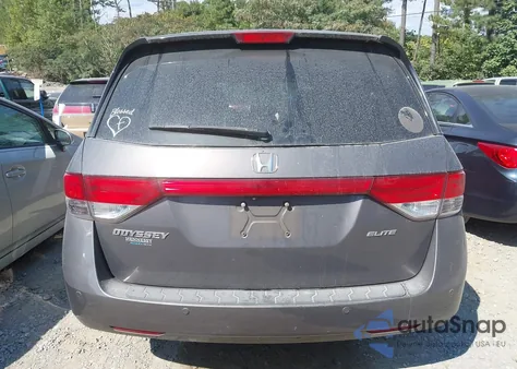 2015 Honda Odyssey Touring/Touring Elite z USA, uszkodzony, nr VIN 5FNRL5H91FB073046